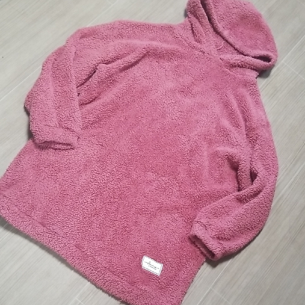 Cozy Pink Turtleneck Sweater with Plush Texture